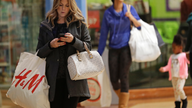 US consumer confidence dips in December, remains strong