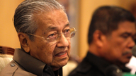 Malaysia's Mahathir to visit China for talks on projects