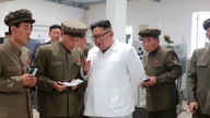 Kim slams local North Koreans for unfinished power plant
