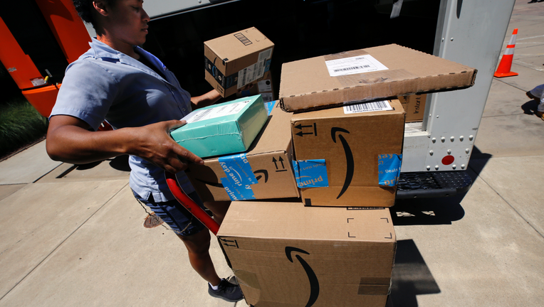 Amazon's quarterly profit tops $2 billion for first time