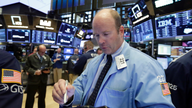 Retail gains and bank losses leave US stocks little changed