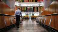 Global stock markets mostly higher as US, China hike tariffs