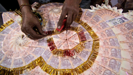 Indian rupee falls to all-time low against dollar