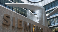Siemens sees lower profit, but books more big-ticket orders