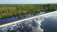 Floodwaters inundate lake at NC power plant, raising alarm