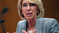Little scrutiny in DeVry sale, as DeVos targets protections