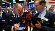 Markets Right Now: Banks lead US indexes lower; tech gains