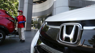 Honda reports rise in profit on cost cuts, healthy sales