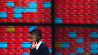 Asian shares mostly lower despite US markets rally