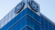 GE slashes dividend, takes $22 billion charge in 3Q