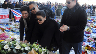 The Latest: Leicester players visit memorial to Thai owner