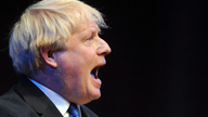 Boris Johnson turns up heat on May at Conservative meeting