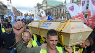 Thousands of Polish police, firefighters march over pay