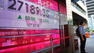 Asian shares mostly fall on weak Japan data, US-China trade