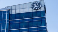 GE's sprawling power, aviation, health care arms add risk