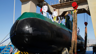 Iran says it has added 2 mini submarines to its naval fleet