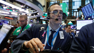 Markets Right Now: Stocks surge on hint of slower rate hikes