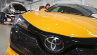 Toyota quarterly profit rises on growing sales, cost cuts