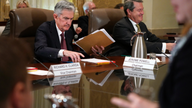 Fed leaves key rate unchanged but sees further hikes ahead