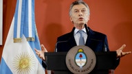 Argentina takes step toward lowering 60% interest rate