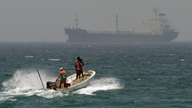 Iran vows to close key strait if US cuts off oil exports