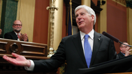 Michigan governor signs bills to gut wage, sick time laws