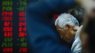 Asian shares mixed on US partial shutdown, Wall Street slump