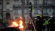 AP FACT CHECK: Trump's trade claims, Paris protesters' chant