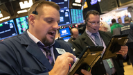 Markets Right Now: Stock market ends mixed after a bumpy day