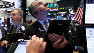 US stocks end dismal, volatile year on a bright note