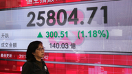 World stocks rise on last day of turbulent year