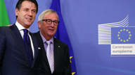 Italy lowers deficit in revised budget to avoid EU sanctions