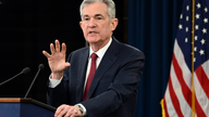 Fed lifts rates for 4th time this year but sees fewer hikes