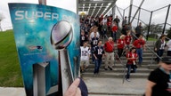 Cashless Super Bowl shopping? Visa, NFL are working on it