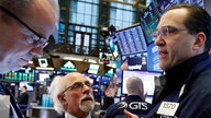 Stocks fall in choppy session, despite trade progress