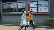 Asian shares mostly higher on US-China trade deal optimism