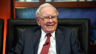 Buffett's firm tweaks stock portfolio, adds Suncor, Red Hat