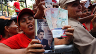 Socialist Maduro seeks to raise dollars with appeal to greed