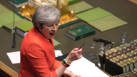 The Latest: UK Parliament votes to hold May to Brexit vow