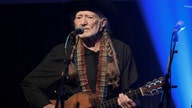 Willie Nelson has given up smoking but he's still using pot