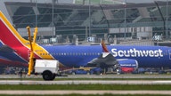 Southwest cuts outlook amid Boeing 737 Max jet groundings