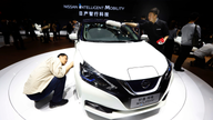 China's auto show highlights electric ambitions