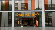 UK blocks Sainsbury's merger with Walmart unit Asda