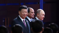 China's Xi promotes building initiative amid debt worries