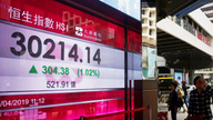 Asian shares mixed after lackluster Wall Street session