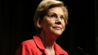 Warren releases 2018 tax return, reveals $900,000 in income
