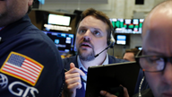 S&P 500, Nasdaq close at record highs as earnings roll in