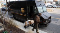 UPS falls short of forecasts on bad weather, costs