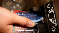 Delta, AmEx renew credit card deal; Delta boosts outlook