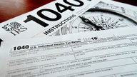 IRS data shows refunds down 2% under new law